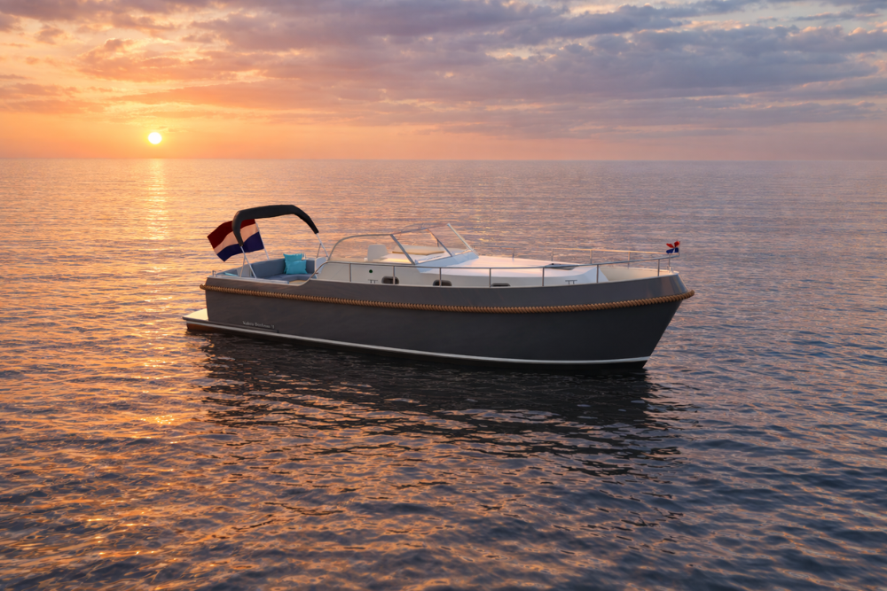 Vedette Cabin Dutchman 35 ft, boot op zee bij zonsondergang