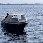 4-Family 530 de Luxe, boot varend op water
