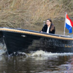 Lago Amore 570 Tender, boot varend op rivier