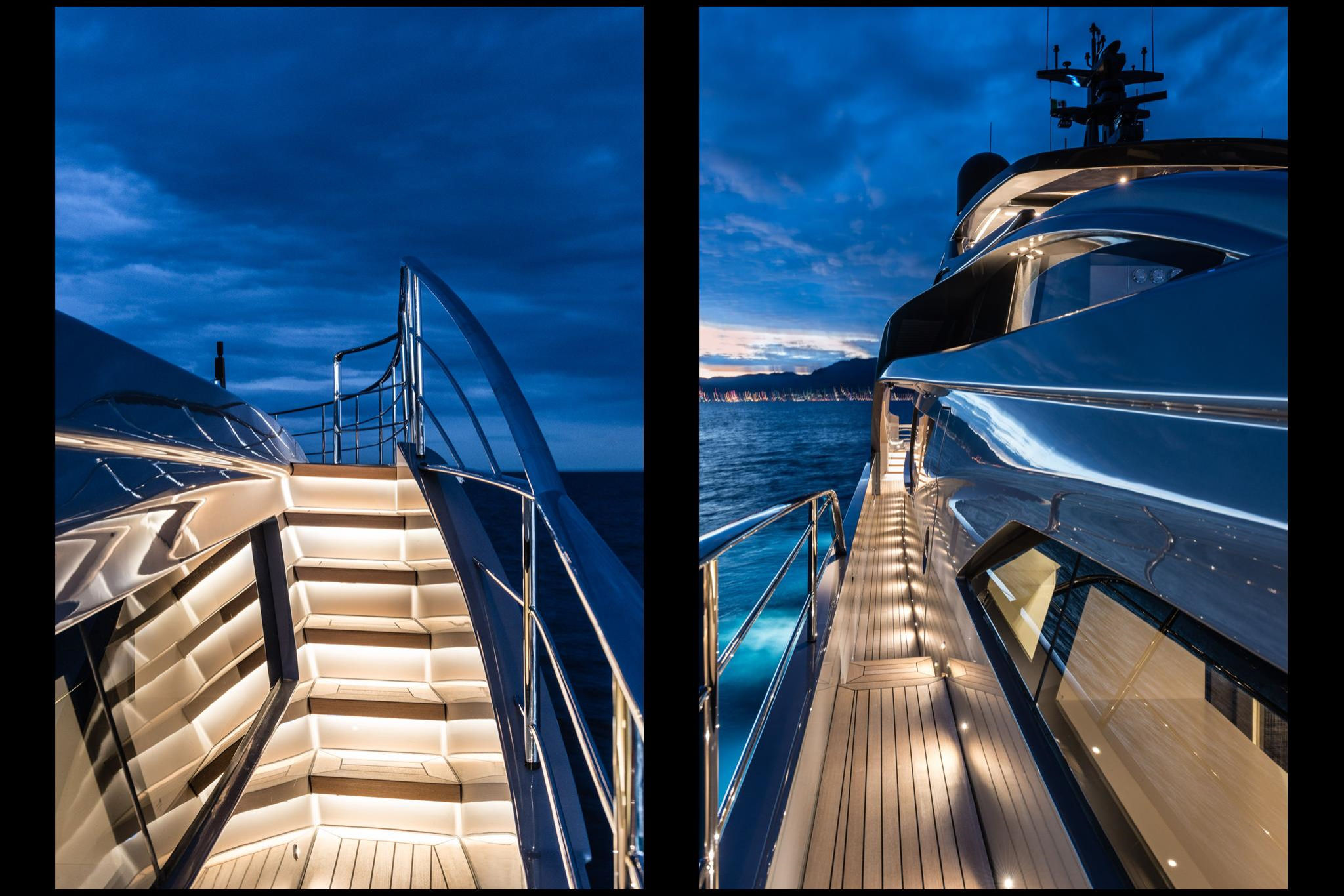 Pershing 140, trap en dek bij avond