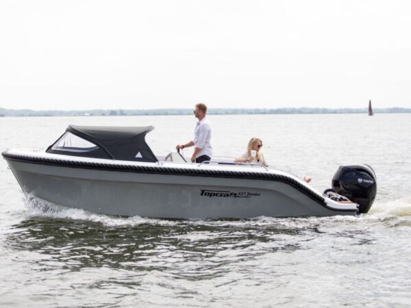 Topcraft 627 Tender, boot varend op water met mensen