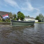 Van Vossen plugin-E-Sloep 650, boot varend op water